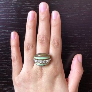 Green golden ring with diamonds